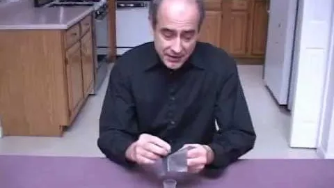Magic Dime Through Sheet Trick